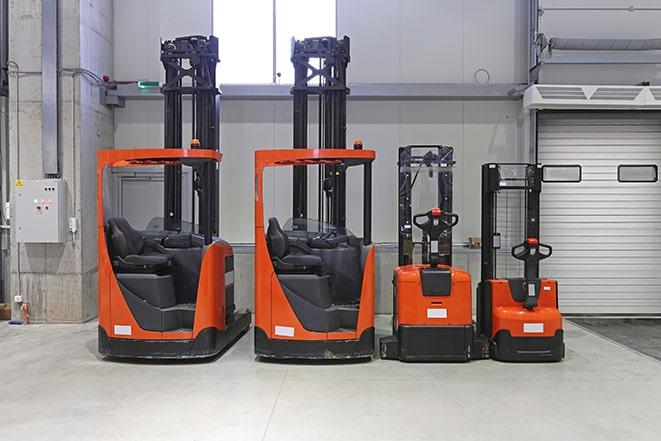 forklift fleet lined up for inspection